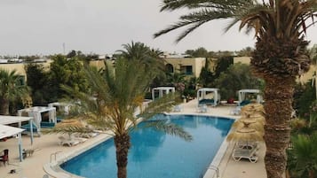 Outdoor pool, pool umbrellas, pool loungers