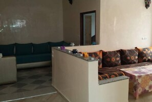 Apartment, 2 Bedrooms, Pool View | Living area | Plasma TV - Mirleft Tayought Guest House (Mirleft)