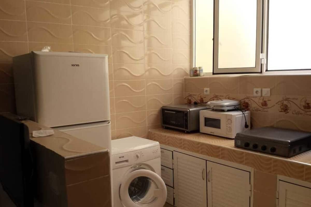 Apartment, 2 Bedrooms | Private kitchen | Oven, stovetop