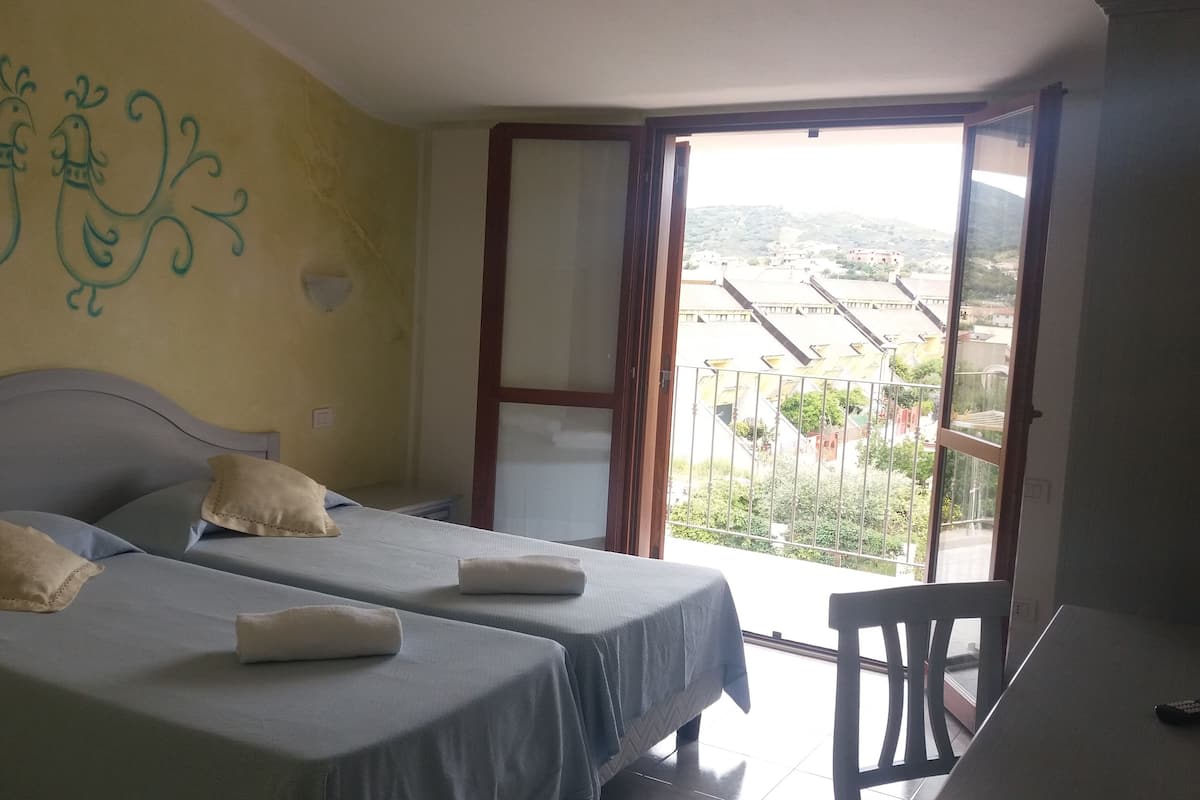 double room, balcony, garden view | individually decorated, individually furnished, desk, soundproofing