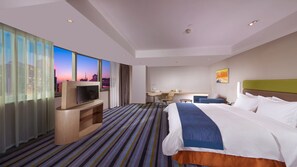 Standard Room, 1 King Bed, City View | 1 bedroom, in-room safe, desk, blackout drapes