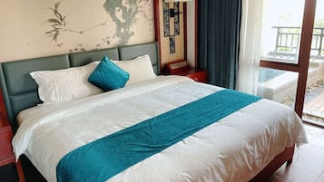 Deluxe Room, Multiple Beds, Non Smoking | Minibar, in-room safe, iron/ironing board, cots/infant beds
