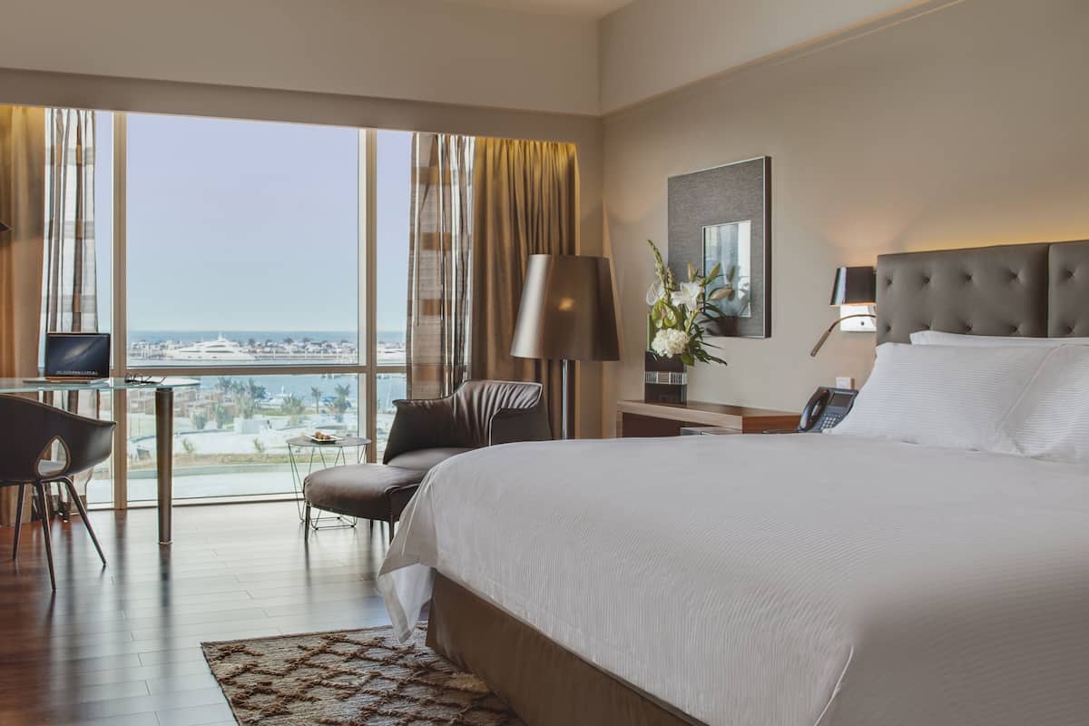 Egyptian cotton sheets, premium bedding, down duvets, minibar