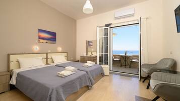 Exclusive Triple Room, 2 Bedrooms | 1 bedroom, premium bedding, in-room safe, soundproofing