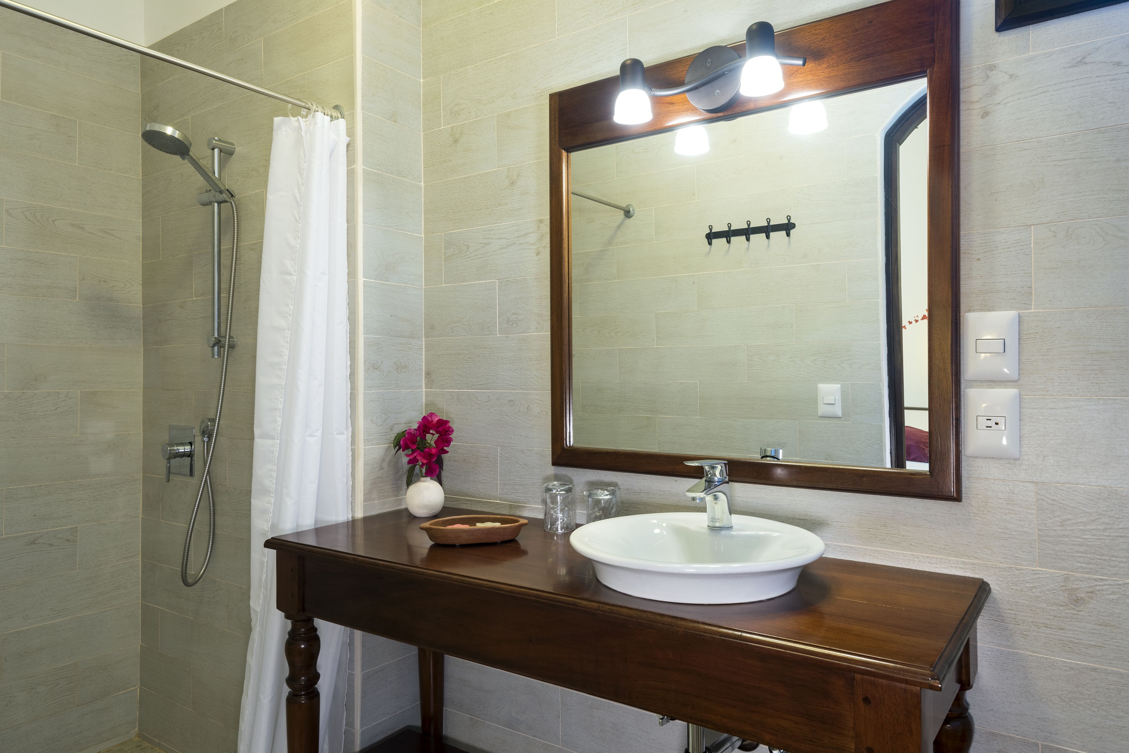 superior room | bathroom | shower, hair dryer, towels
