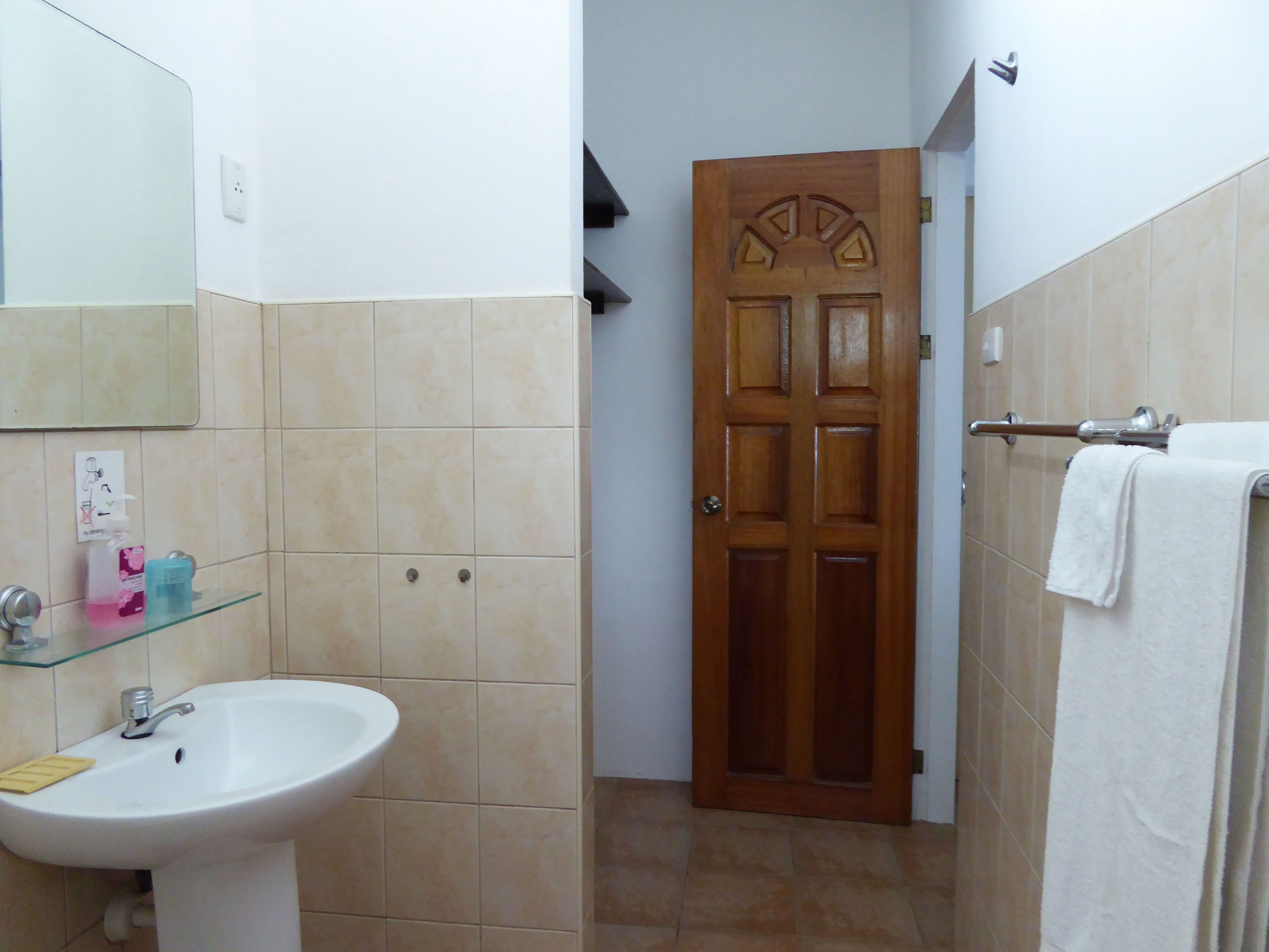 room | bathroom | shower, towels, soap, shampoo