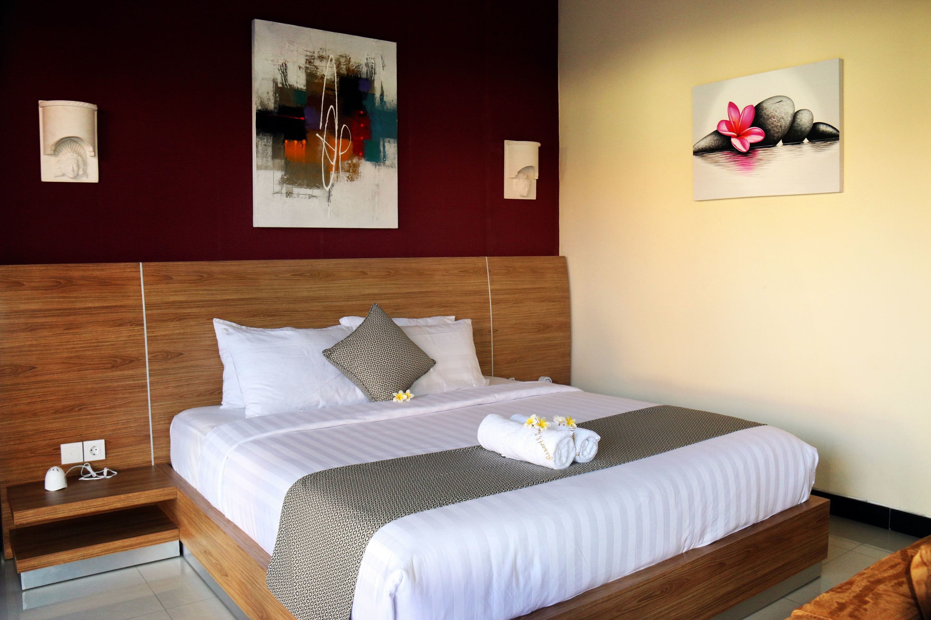 deluxe triple room | 1 bedroom, minibar, in-room safe, blackout curtains