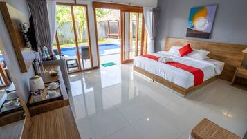 Standard Deluxe with Pool Access | Minibar, in-room safe, blackout drapes, free cribs/infant beds