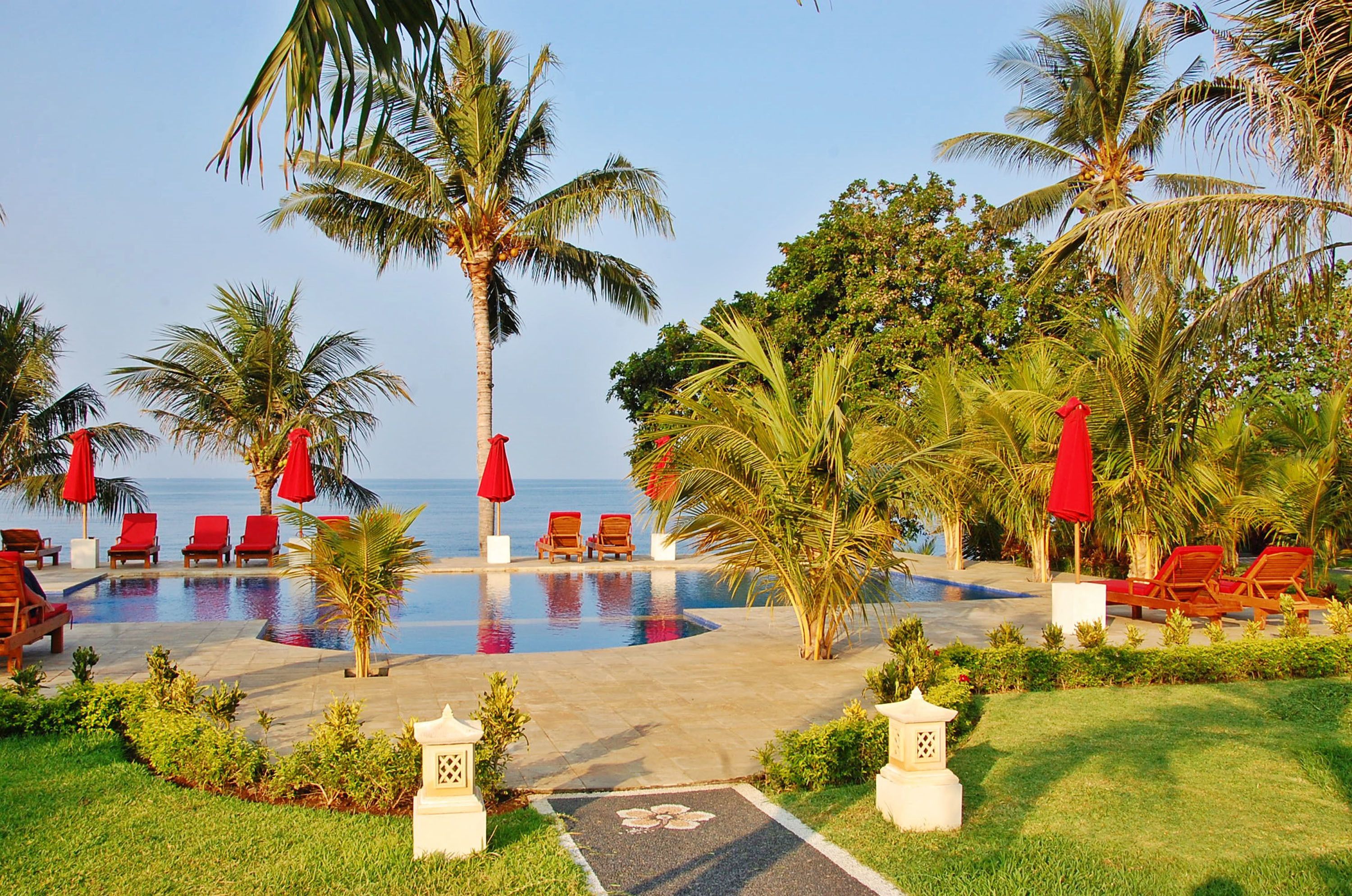 outdoor pool, pool umbrellas, pool loungers