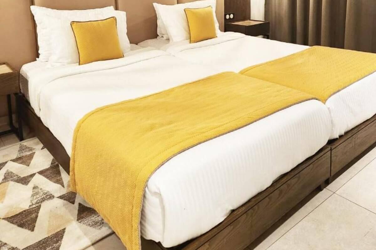 Premium bedding, memory-foam beds, minibar, in-room safe
