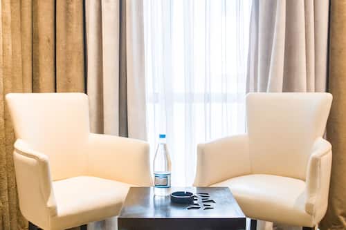 Premium bedding, memory foam beds, minibar, in-room safe