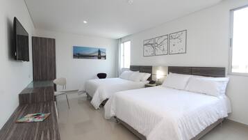 Premium bedding, down comforters, pillowtop beds, minibar