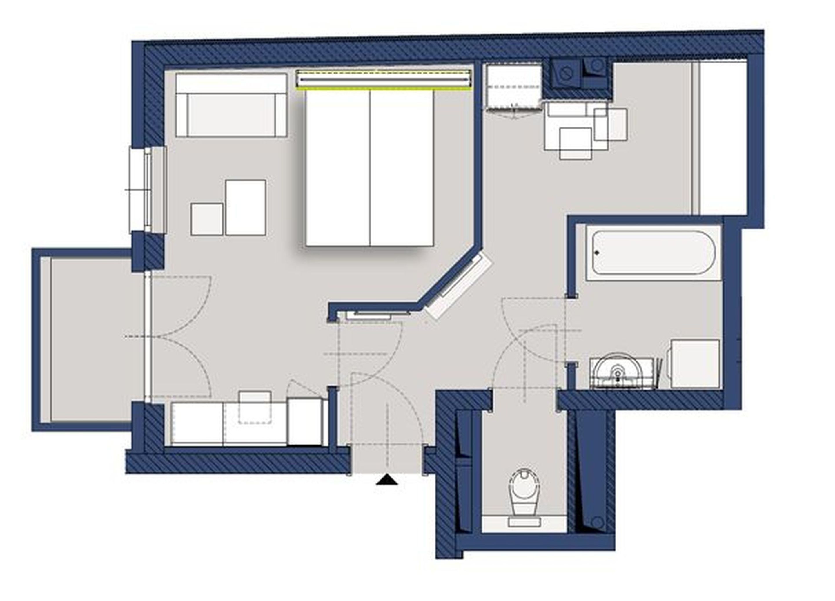 Een plattegrond van een hotelkamer met een bed, een badkamer, een zithoek en een kitchenette.
