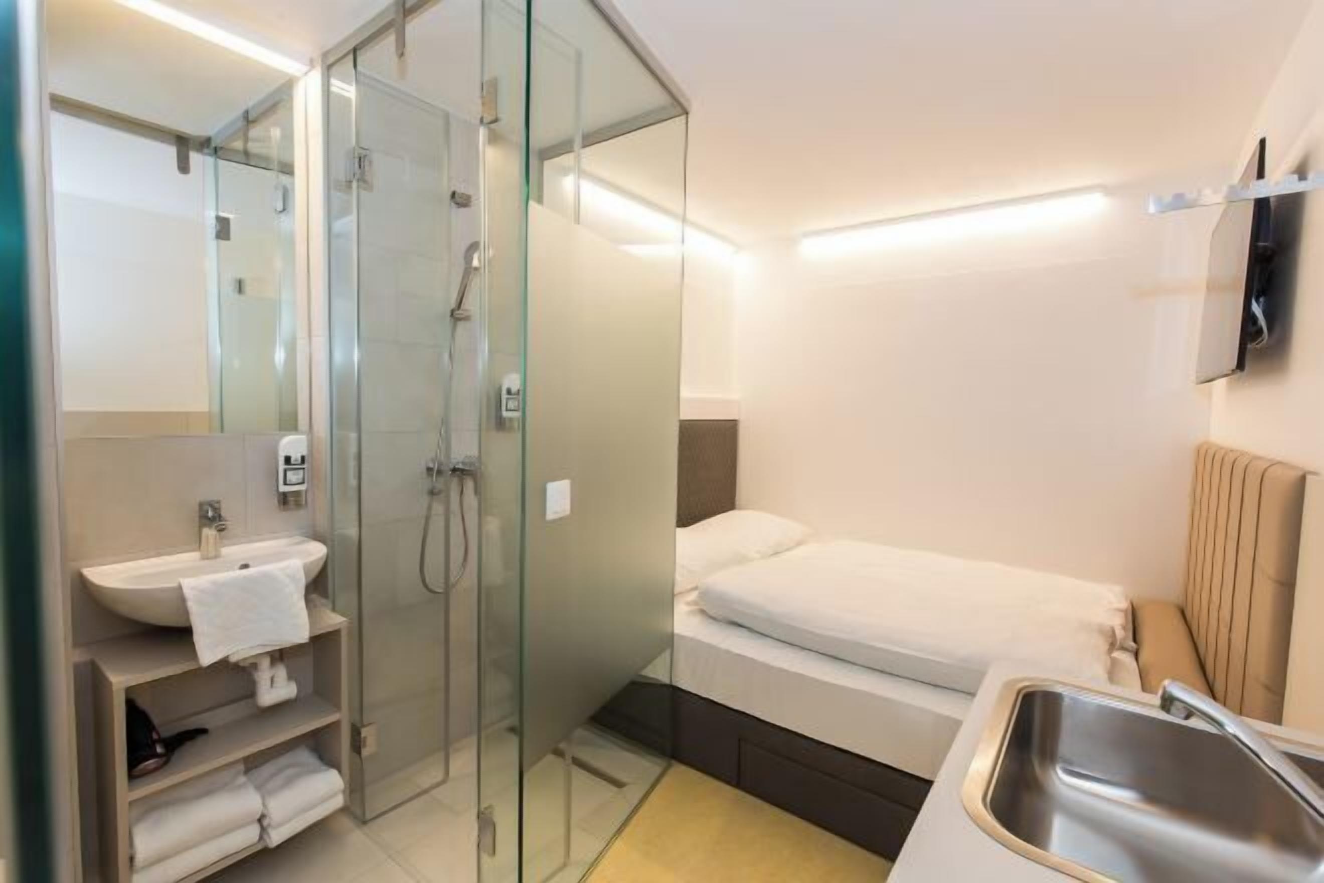 1 chambre, literie hypoallergénique, couette en duvet d'oie