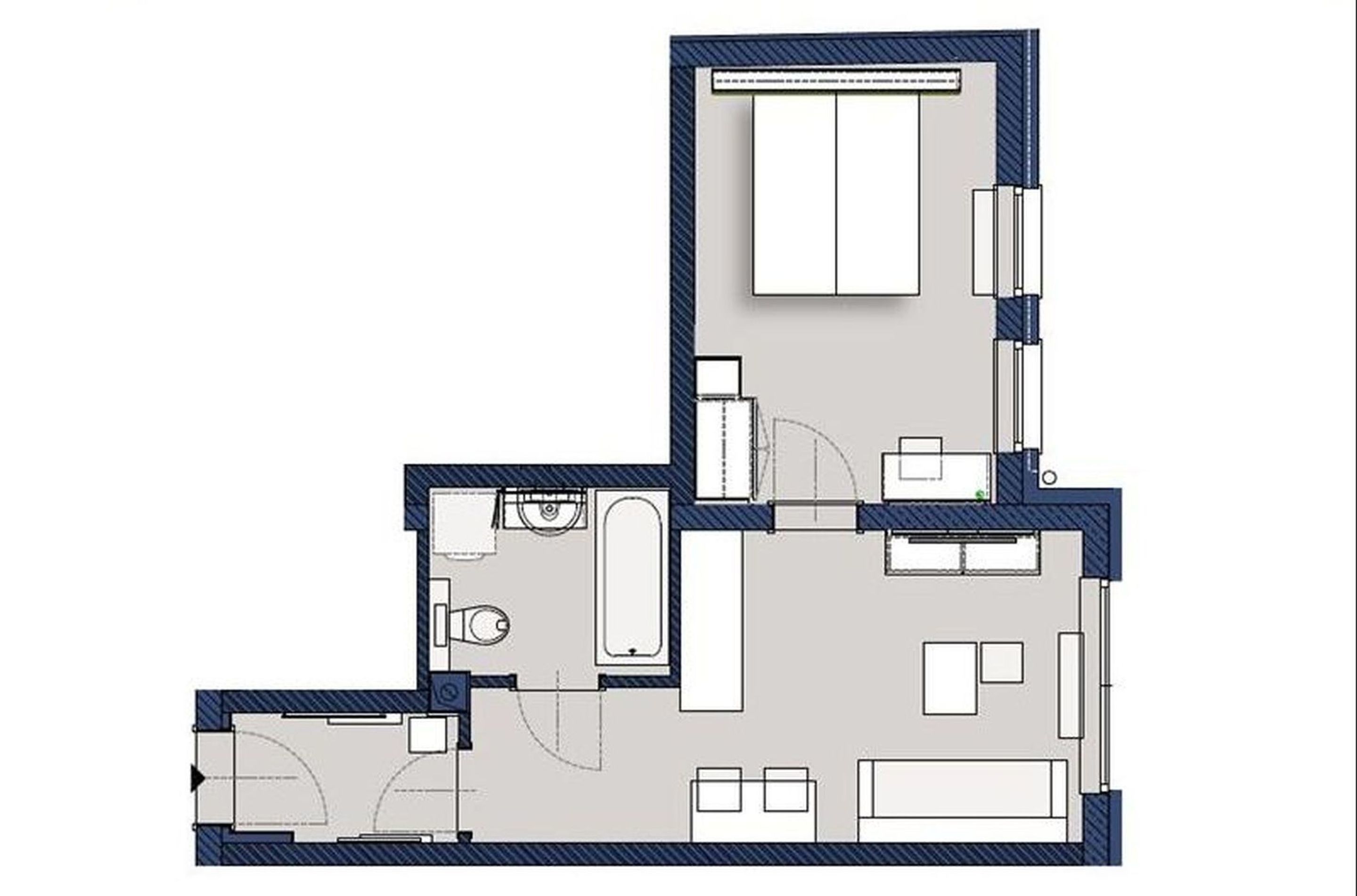 A floor plan of a hotel room with a bathroom, a living area, and a dining area.