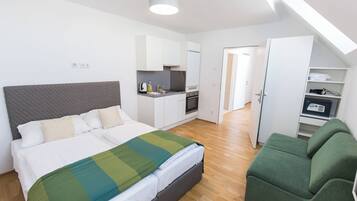 Deluxe Apartment, Balcony | 1 bedroom, hypo-allergenic bedding, down duvets, in-room safe