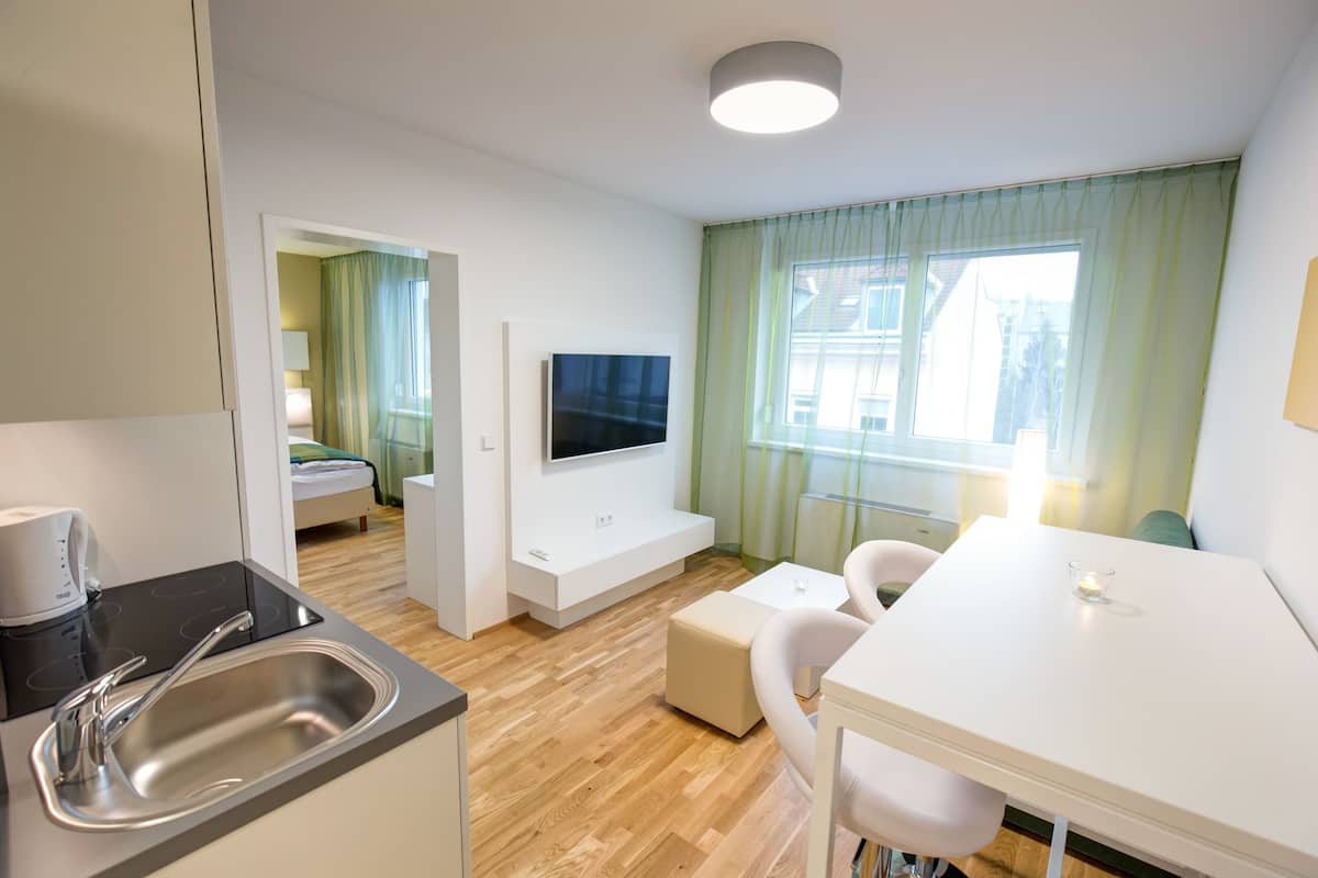 Apartamento superior, 1 habitación | 1 dormitorio, ropa de cama hipoalergénica, edredones de plumas