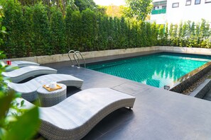Outdoor pool, open 6 AM to 9 PM, pool umbrellas, pool loungers - Jira Boutique Residence (Chiang Mai)