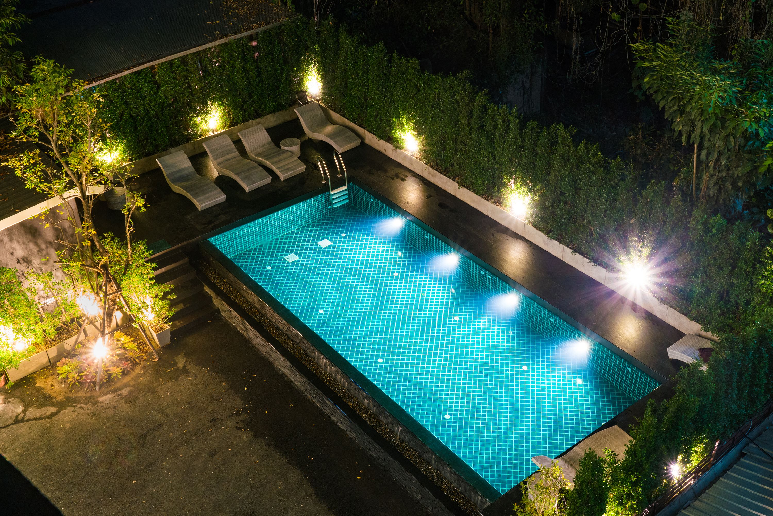 outdoor pool, open 6 am to 9 pm, pool umbrellas, pool loungers