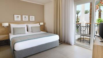 Minibar, caja de seguridad en la habitación, escritorio y ropa de cama