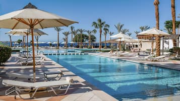 Outdoor pool, pool umbrellas, sun loungers