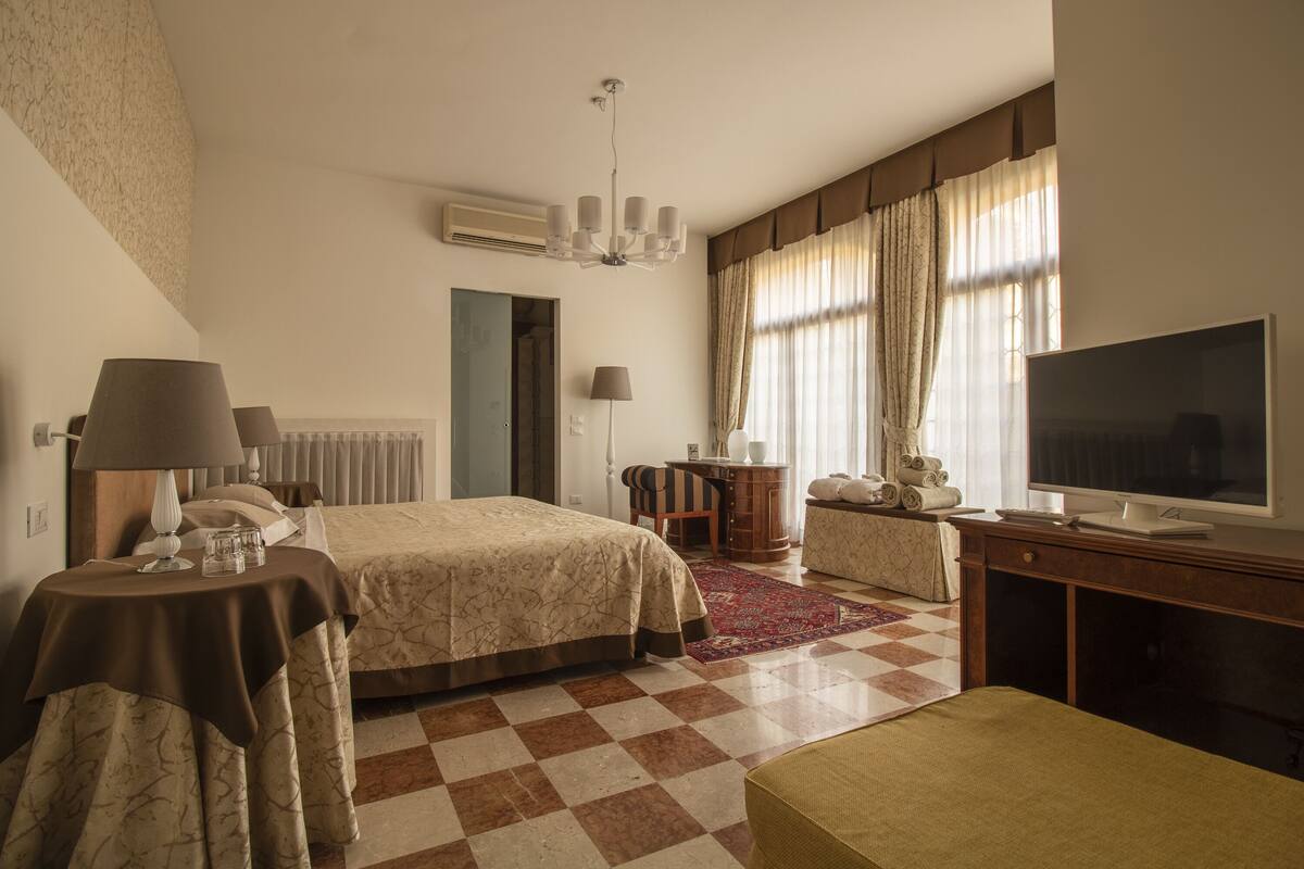 Luxury Suite, 1 King Bed with Sofa bed, Accessible, Garden View | Premium bedding, blackout curtains, free WiFi, bed sheets