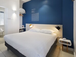 Habitación Confort | Escritorio, wifi gratis, ropa de cama