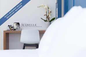 Habitación superior | Escritorio, wifi gratis, ropa de cama