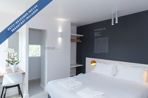 Habitación superior | Escritorio, wifi gratis y ropa de cama