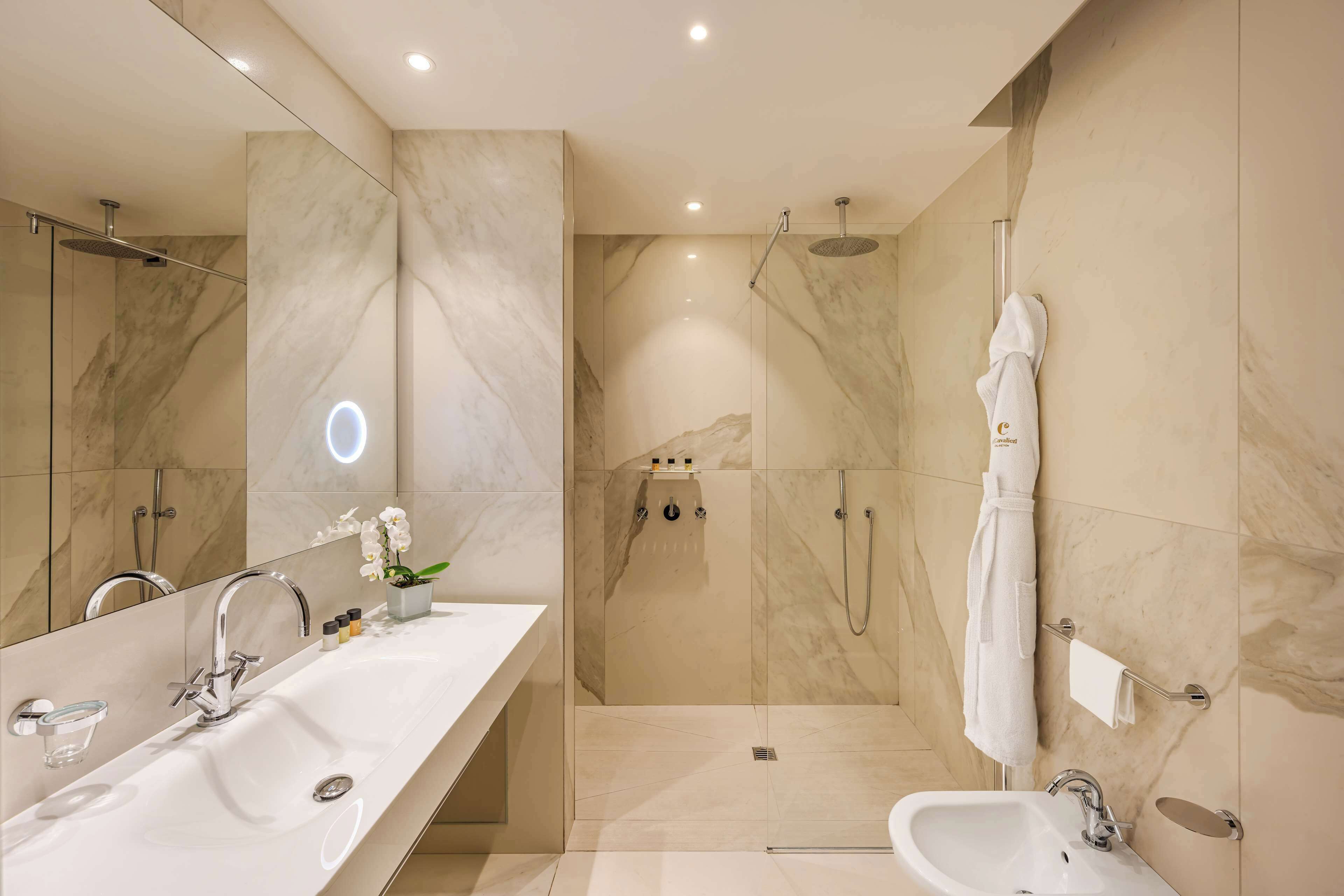 exclusive double room | bathroom | shower, rainfall showerhead, slippers, towels
