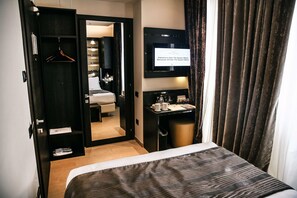 Ropa de cama de alta calidad, edredón y minibar 