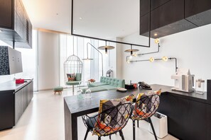 Superior Studio Suite | Living room | 42-inch LED TV with cable channels, TV - The Place Tainan (Tainan)