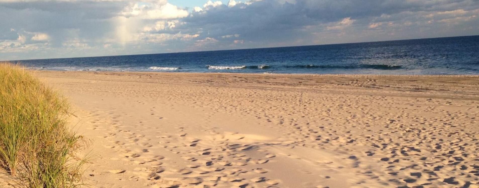 private beach, white sand, sun-loungers, beach umbrellas