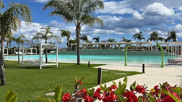 Indoor pool, 2 outdoor pools, open 8:30 AM to 7:00 PM, pool umbrellas