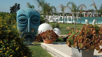 Indoor pool, 2 outdoor pools, open 9:30 AM to 7:00 PM, pool umbrellas