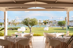 Breakfast, lunch, dinner served; international cuisine, pool views