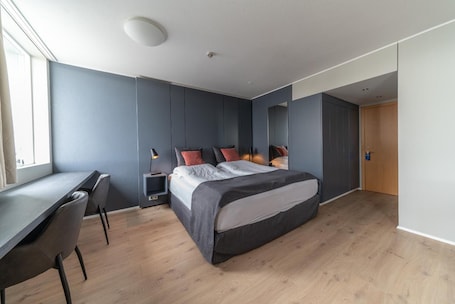 Desk, laptop workspace, blackout curtains, soundproofing