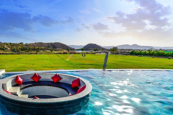 Outdoor pool, pool umbrellas, pool loungers