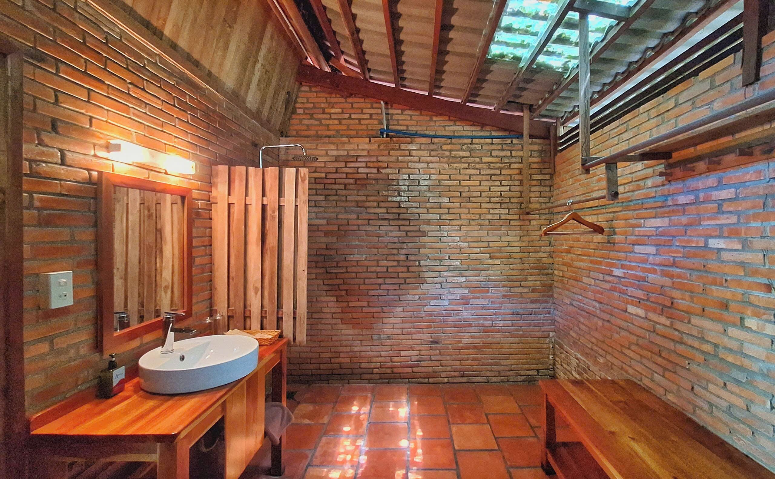 bungalow, partial sea view | bathroom | shower, free toiletries, hair dryer, slippers