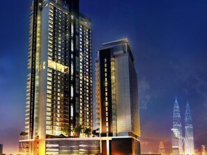A high-rise hotel with multiple floors, large windows, and a modern architectural design. - Fraser Residence Kuala Lumpur (Kuala Lumpur)