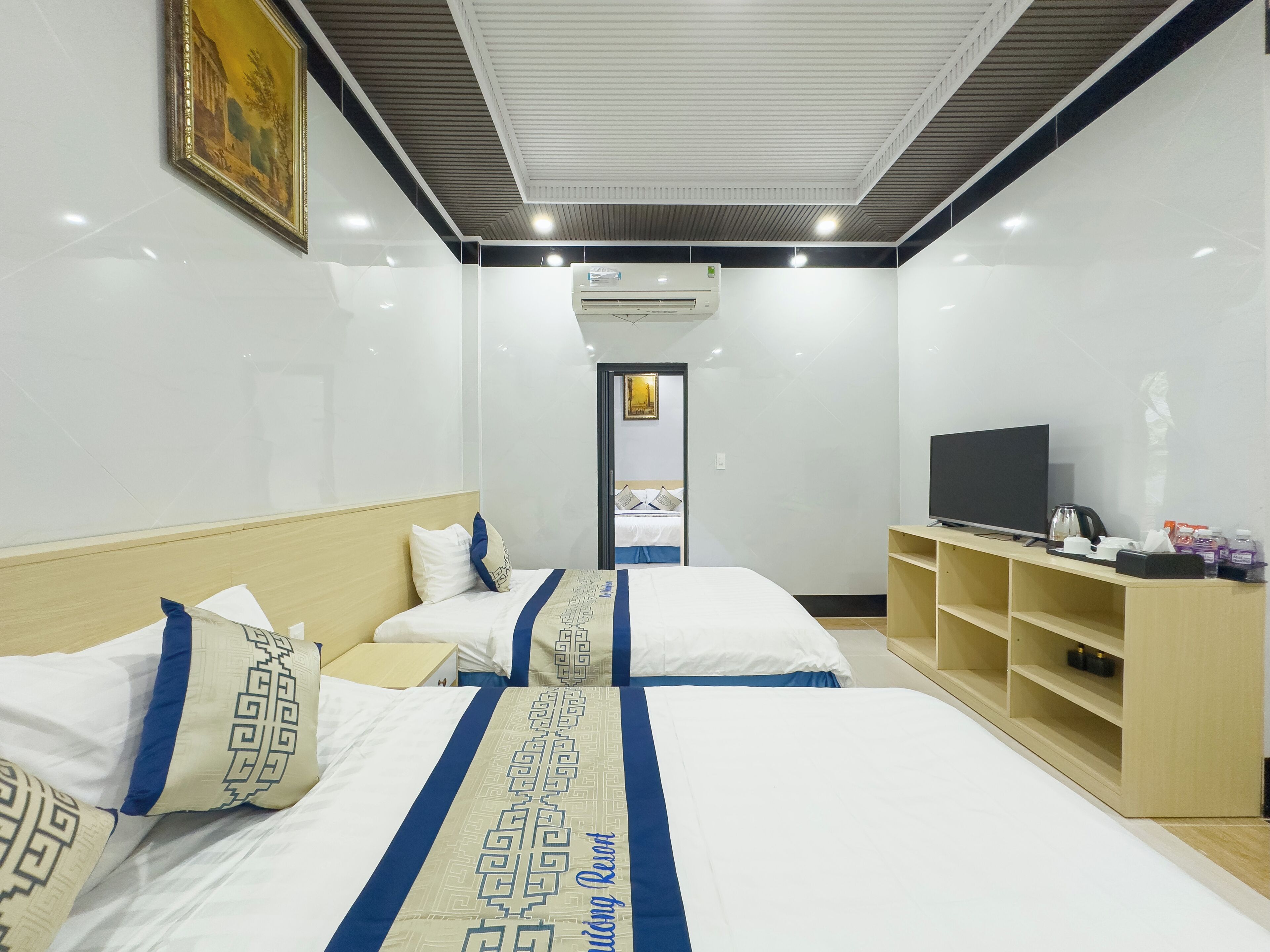 Familierom, 2 soverom | Minibar, individuelt dekorert, individuelt innredet og skrivebord