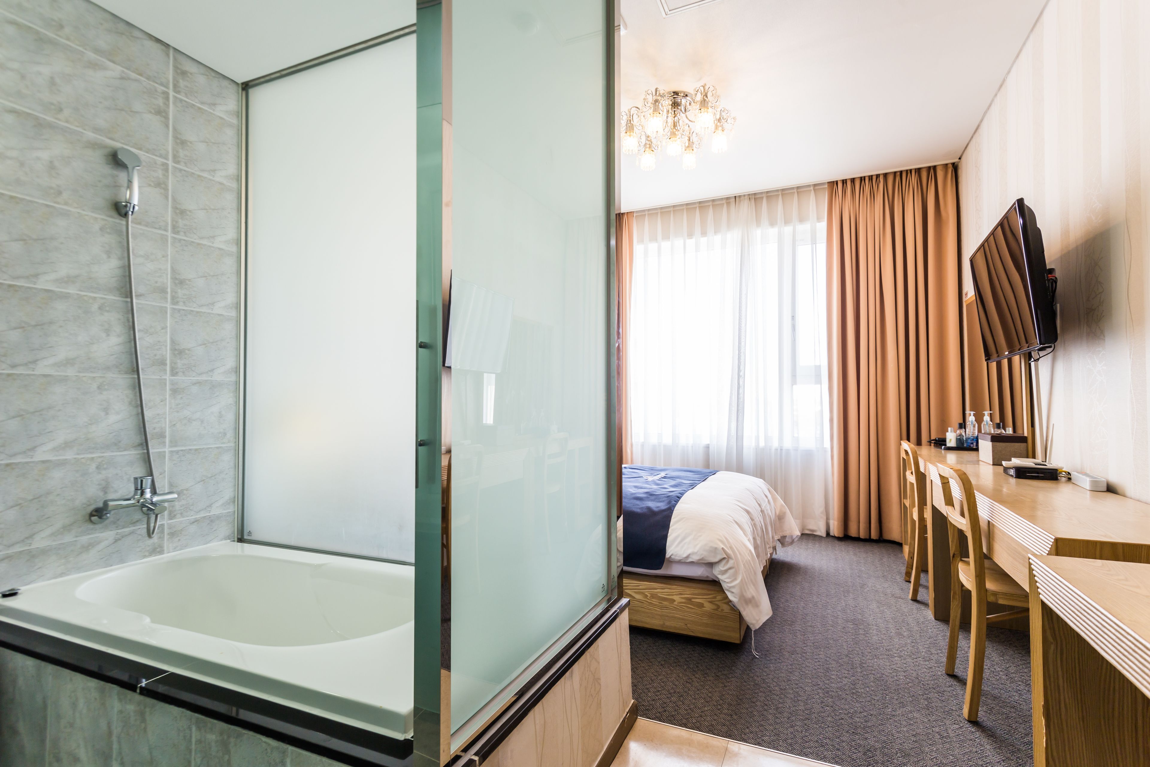 deluxe double room | premium bedding, down duvets, individually furnished, desk