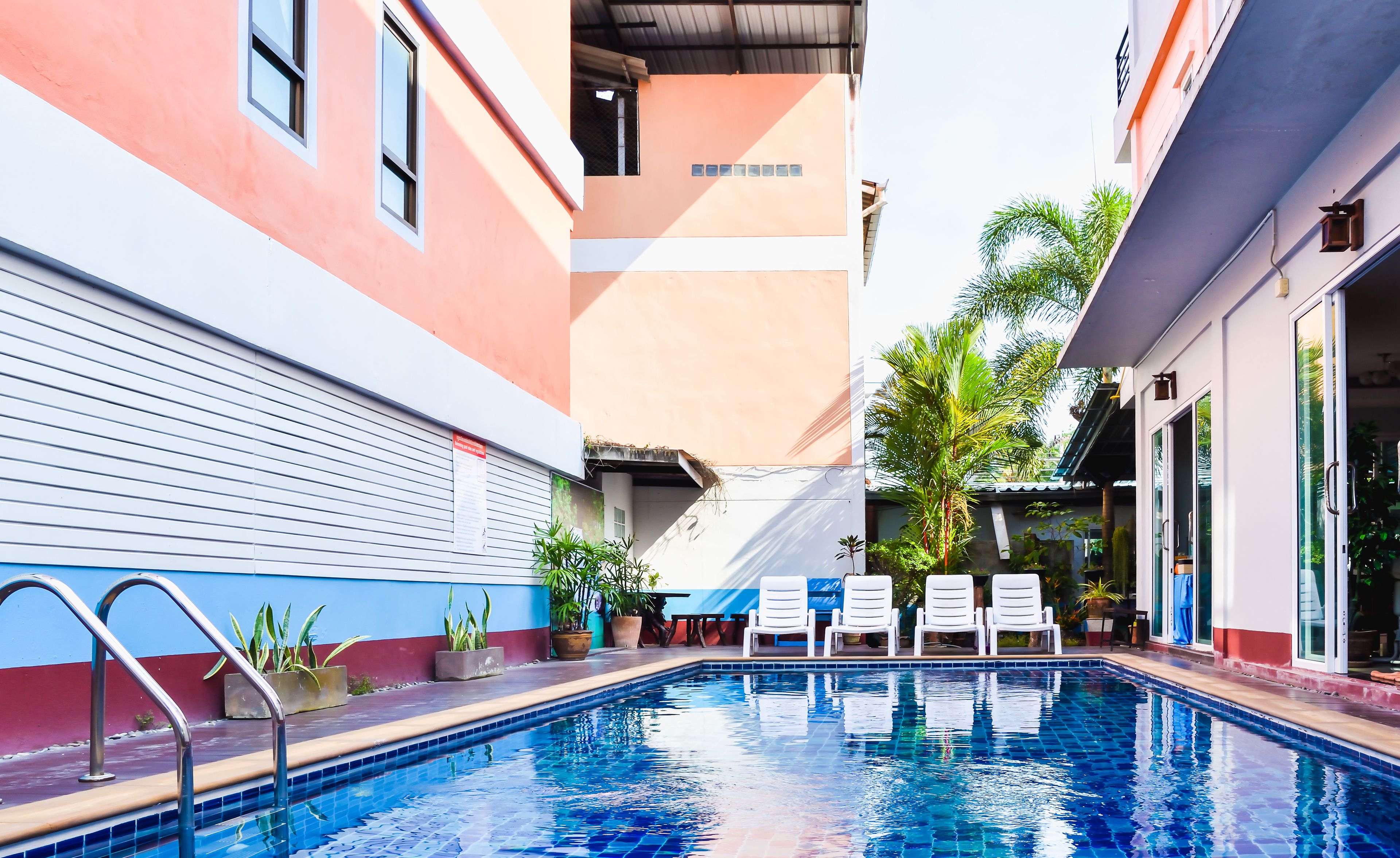 Outdoor pool, pool umbrellas, pool loungers