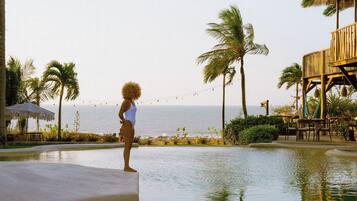 Outdoor pool, open 9:00 AM to 9:00 PM, sun loungers