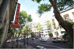 A street view with a hotel sign reading "HOTEL DE FRANCE". - Hotel de France (Paris)