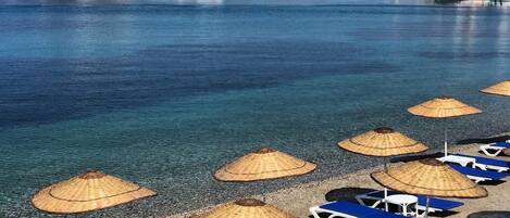 Private beach, sun-loungers, beach umbrellas, beach towels