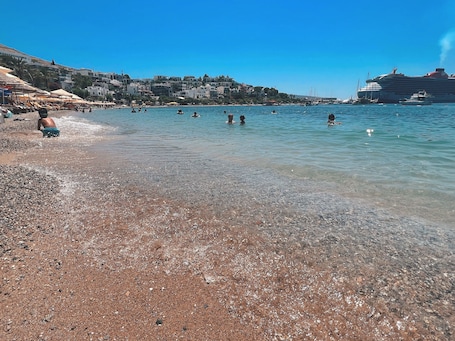 Private beach, sun loungers, beach umbrellas, beach towels