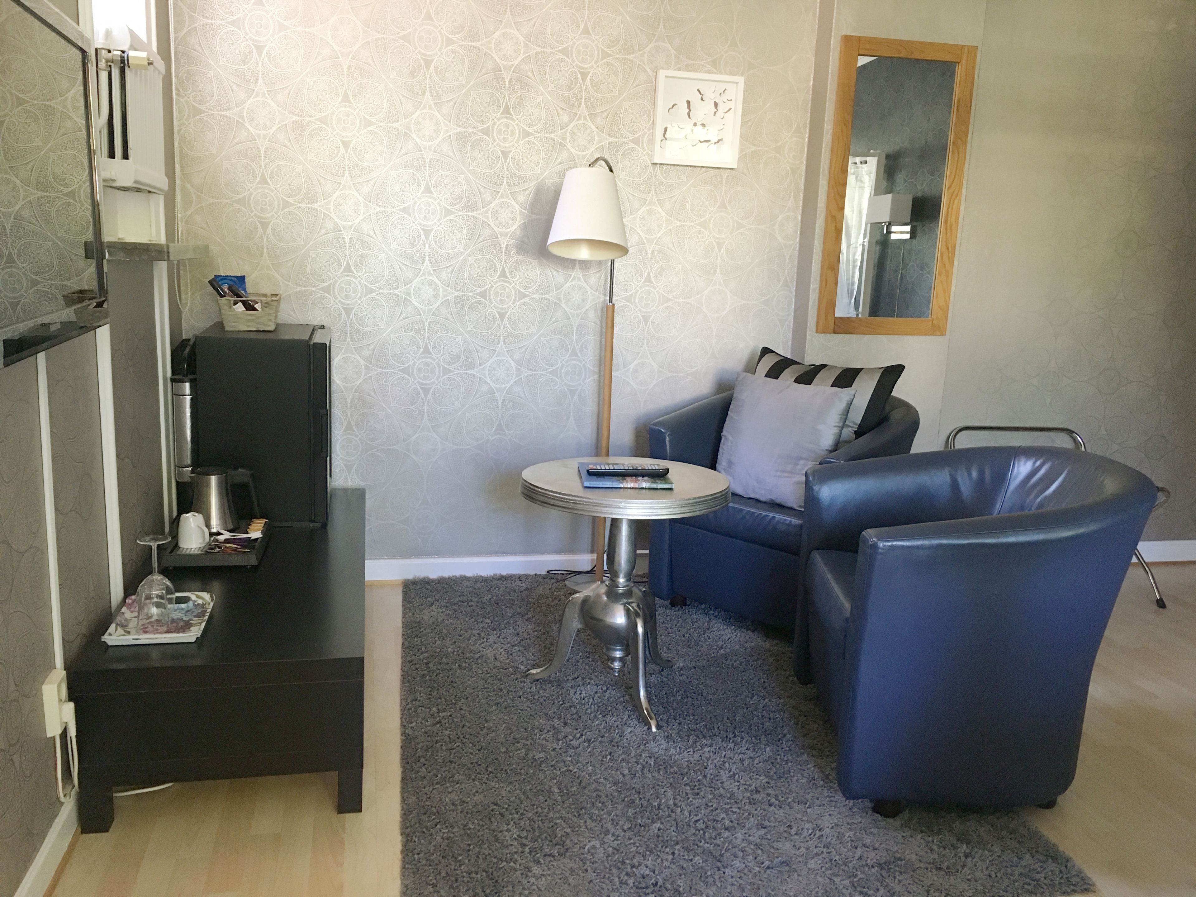 superior room | living area | 32-inch flat-screen tv with cable channels, tv