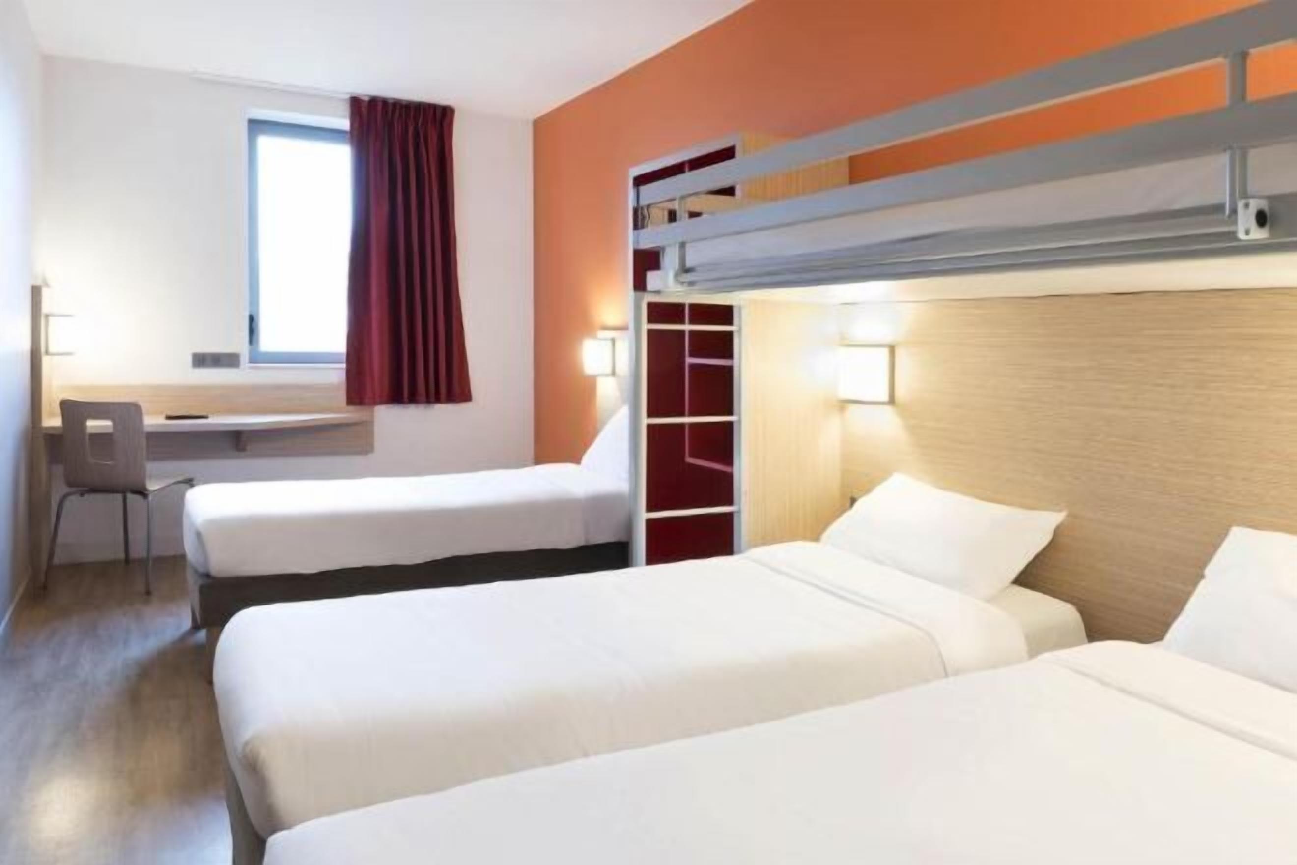 Desk, blackout drapes, free cribs/infant beds, free WiFi