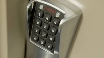 A keypad lock on a door.
